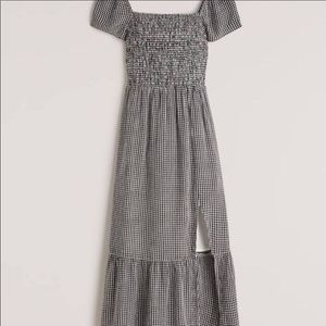 Off the shoulder dress, with slit on the side.